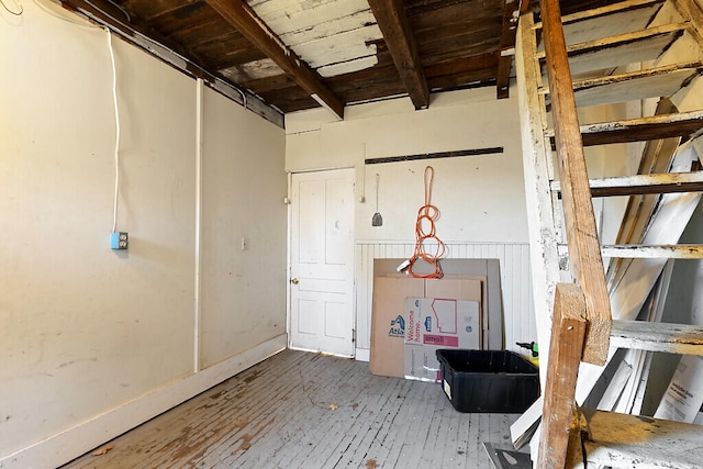 interior space with wood ceiling and hardwood / wood-style floors