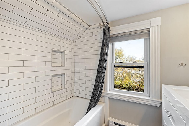 bathroom with vanity, vaulted ceiling, shower / tub combo, and baseboard heating