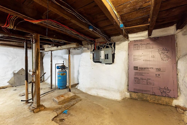 unfinished below grade area featuring electric panel