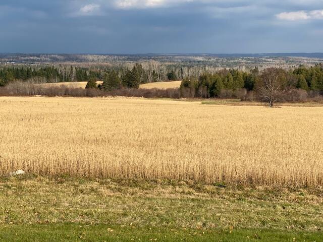 property view of mountains featuring a rural view