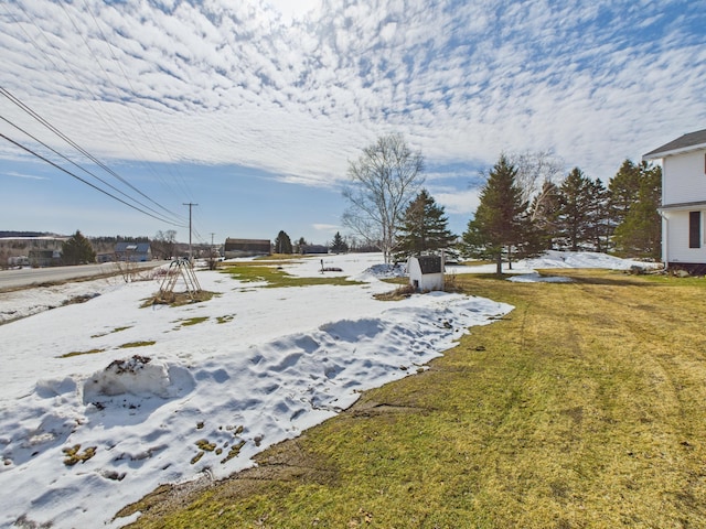 1388 Van Buren Rd, Connor Twp, ME 04736 - snowy yard featuring a storage shed and an outdoor structure