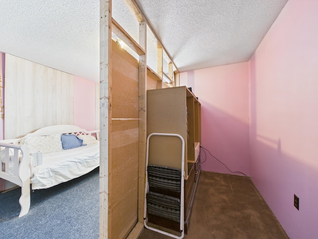 1388 Van Buren Rd, Connor Twp, ME 04736 - bedroom with a textured ceiling and carpet