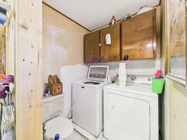 1388 Van Buren Rd, Connor Twp, ME 04736 - laundry area with cabinet space and washing machine and dryer