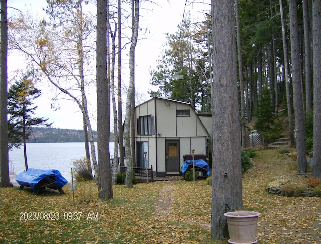 162 Hill Rd Unit T1 R9, Wels, ME 04462 - view of front facade featuring a water view