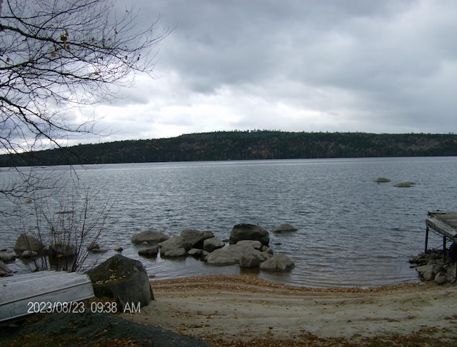 162 Hill Rd Unit T1 R9, Wels, ME 04462 - property view of water featuring a view of trees