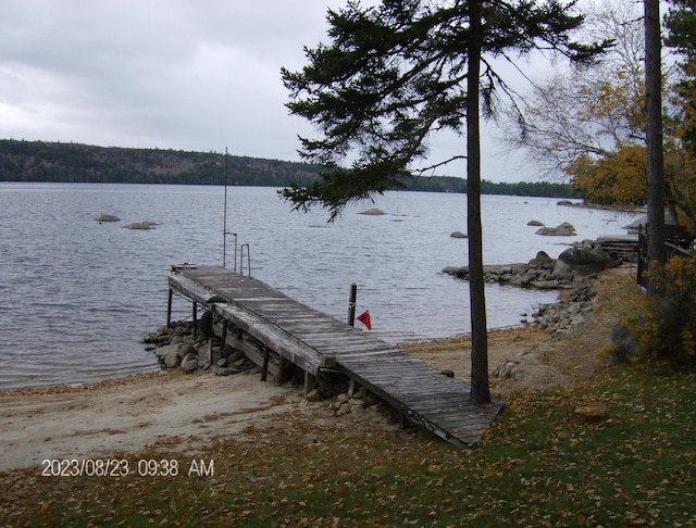 view of dock with a water view