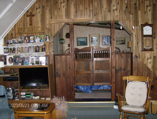 living room featuring wooden walls