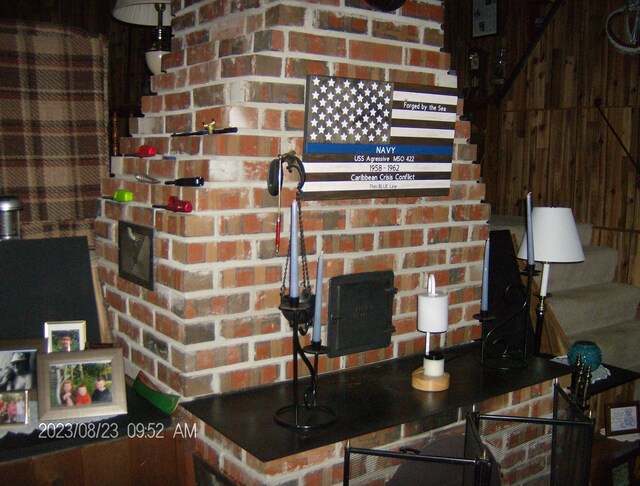 kitchen featuring brick wall