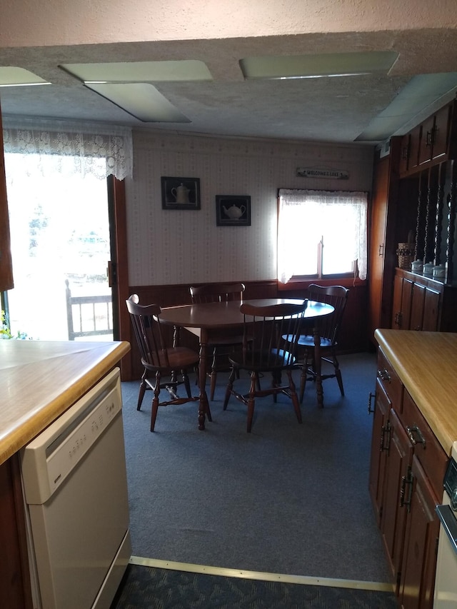 dining room with dark carpet