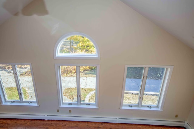 32 Morison Ave, Wells, ME 04090 - interior space with wood finished floors, lofted ceiling, and a baseboard radiator