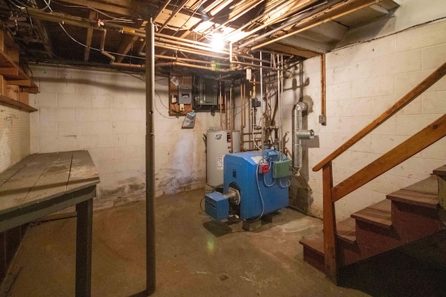 32 Morison Ave, Wells, ME 04090 - unfinished below grade area with water heater, stairway, and a heating unit
