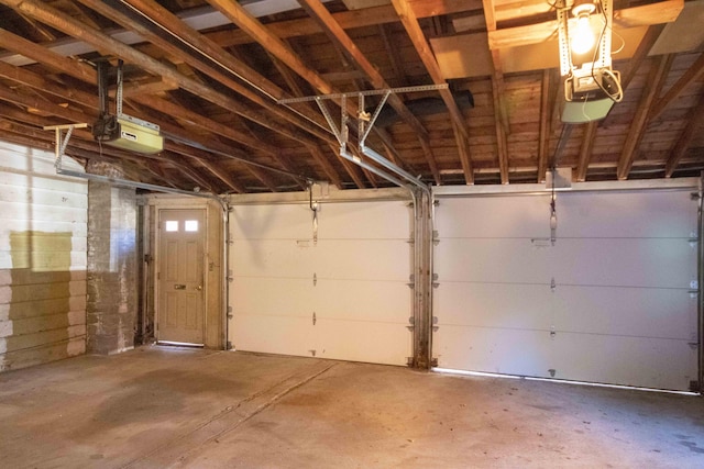 32 Morison Ave, Wells, ME 04090 - garage featuring a garage door opener