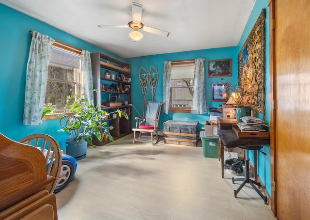 interior space featuring ceiling fan