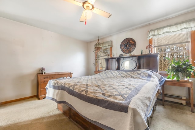 bedroom featuring ceiling fan, light carpet, and a baseboard radiator