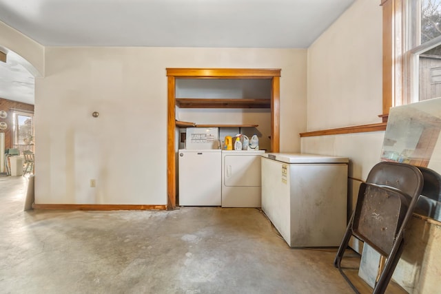 laundry room with washing machine and dryer