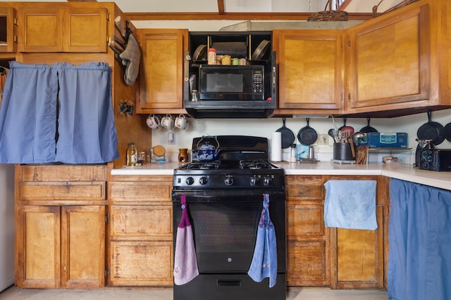 kitchen with black appliances