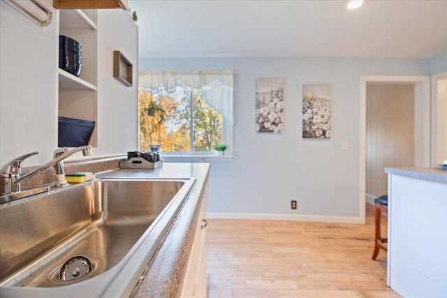 kitchen featuring light hardwood / wood-style floors and sink