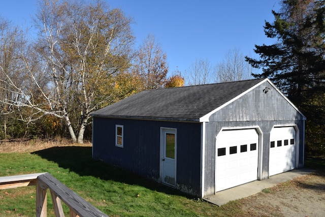 garage with a lawn