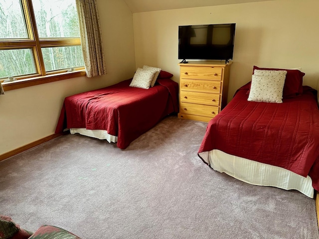 6071 Village On The Green Rd Unit G-11, Carrabassett Valley, ME 04947 - carpeted bedroom featuring lofted ceiling