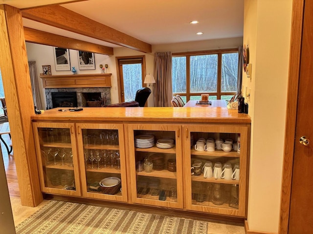 6071 Village On The Green Rd Unit G-11, Carrabassett Valley, ME 04947 - bar featuring a fireplace and recessed lighting