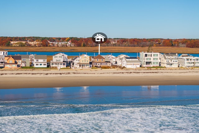 property view of water with a beach view