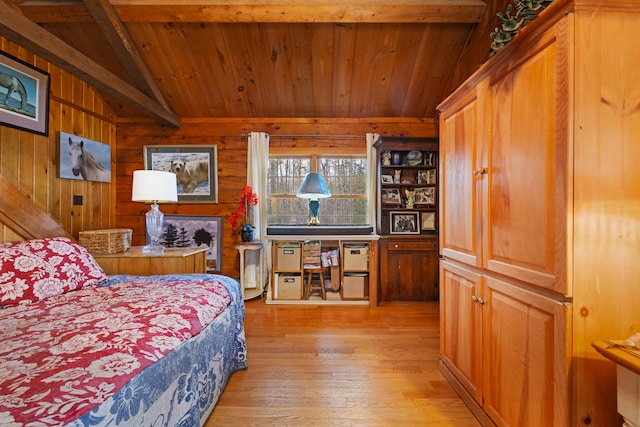 bedroom with light wood-type flooring, lofted ceiling with beams, wood ceiling, and wood walls