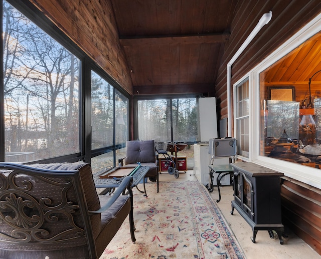 sunroom featuring wooden ceiling