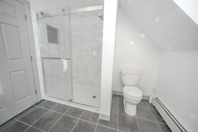 bathroom with a baseboard heating unit, tile patterned flooring, toilet, and an enclosed shower