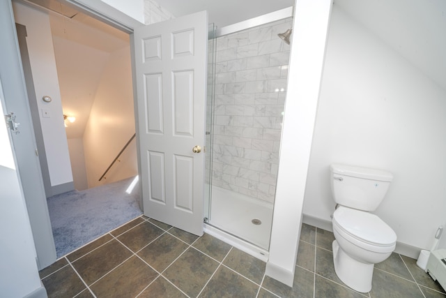 bathroom with toilet, tile patterned floors, a baseboard radiator, and a shower with door