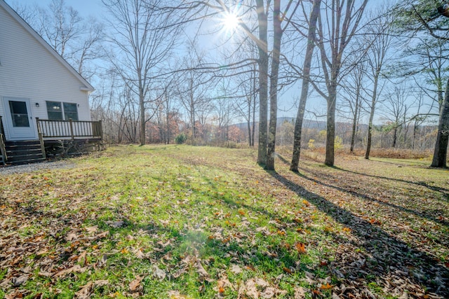 view of yard with a deck