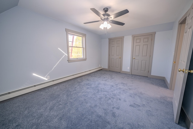 unfurnished bedroom with ceiling fan, carpet flooring, lofted ceiling, and baseboard heating