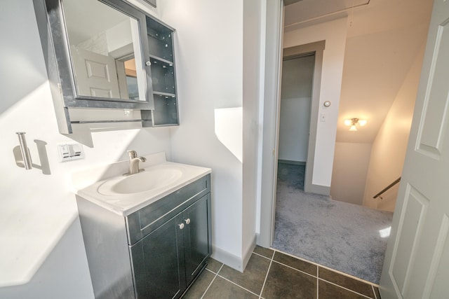 bathroom featuring vanity and tile patterned flooring