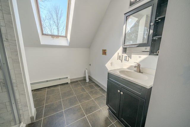 bathroom with a baseboard radiator, an enclosed shower, tile patterned floors, vanity, and lofted ceiling with skylight