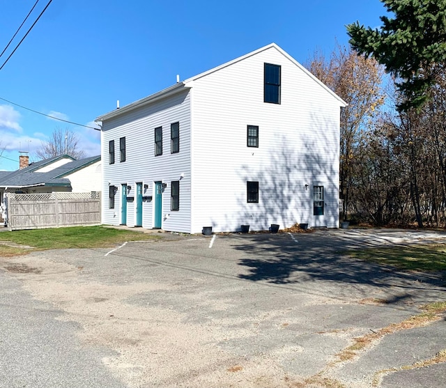 back of house with a garage