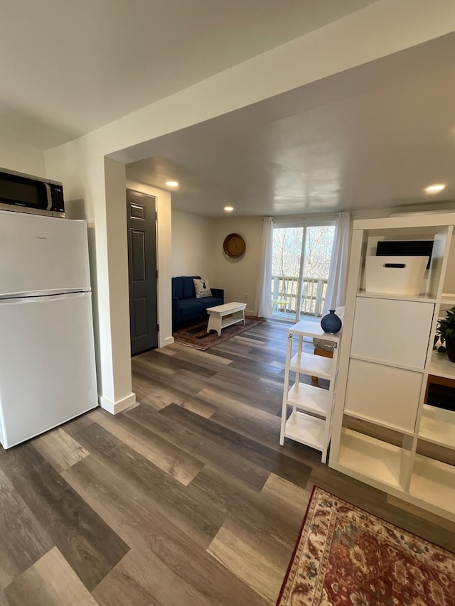 living room featuring dark hardwood / wood-style floors