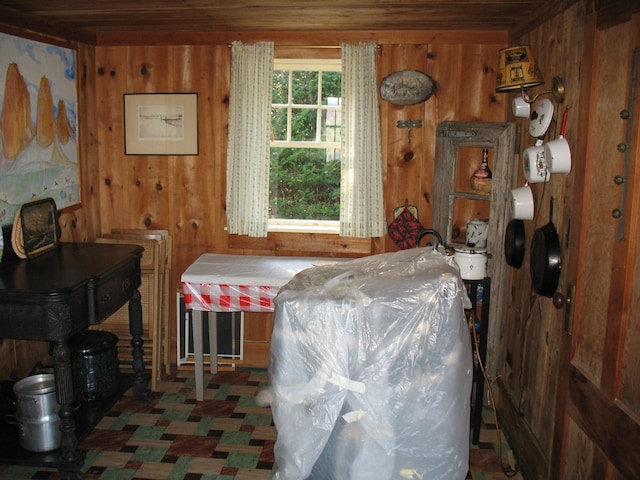 interior space featuring wood walls