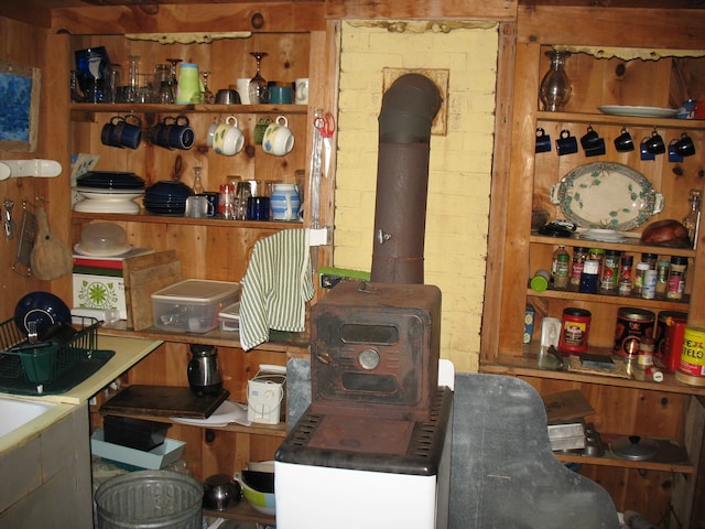 interior space with a wood stove