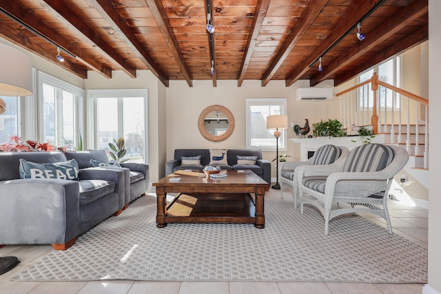 living room with track lighting, a wall mounted air conditioner, wood ceiling, beamed ceiling, and light tile patterned floors