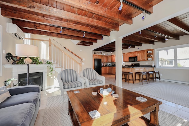 tiled dining room featuring baseboard heating, beamed ceiling, a wall mounted AC, and wooden ceiling