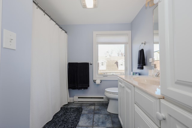 167 S Tibbetts Ave, Wells, ME 04090 - bathroom with baseboard heating, vanity, toilet, a shower with shower curtain, and baseboards