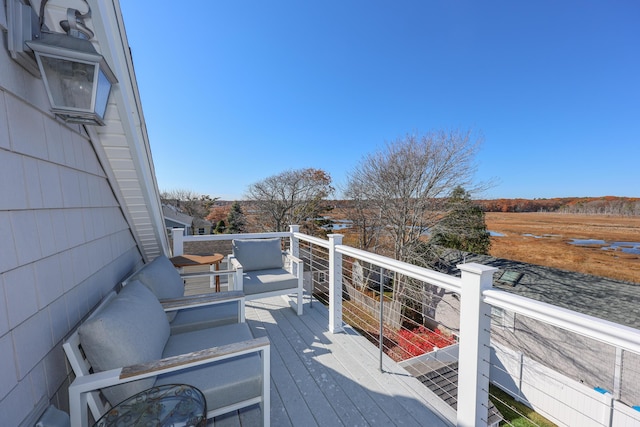 167 S Tibbetts Ave, Wells, ME 04090 - wooden deck with an outdoor hangout area