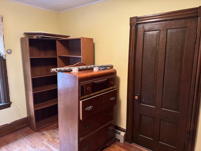 17 York St, Mars Hill, ME 04758 - interior space featuring light wood-style flooring and a baseboard heating unit