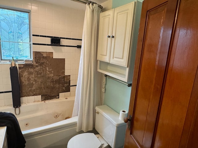 bathroom with toilet and shower / bathtub combination with curtain