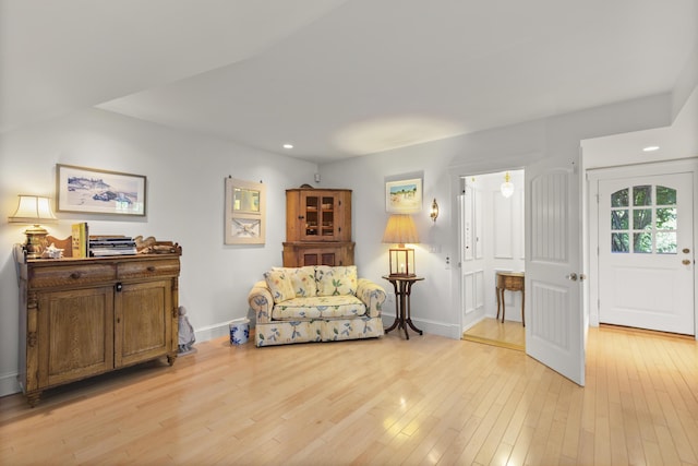 sitting room featuring light hardwood / wood-style floors