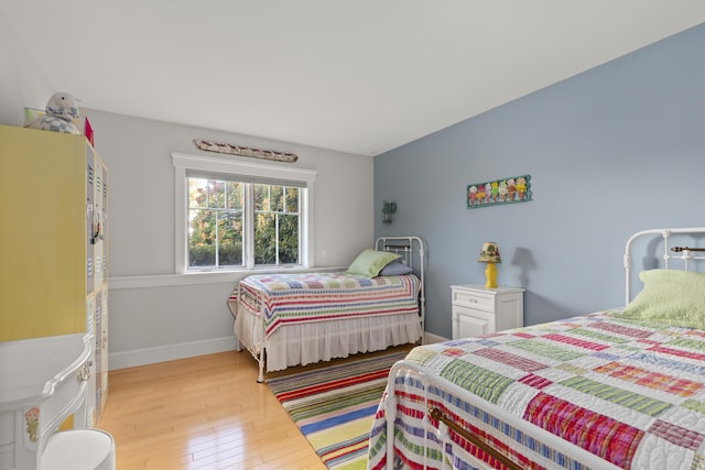 bedroom with light hardwood / wood-style flooring