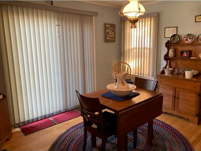 dining room with light wood-type flooring