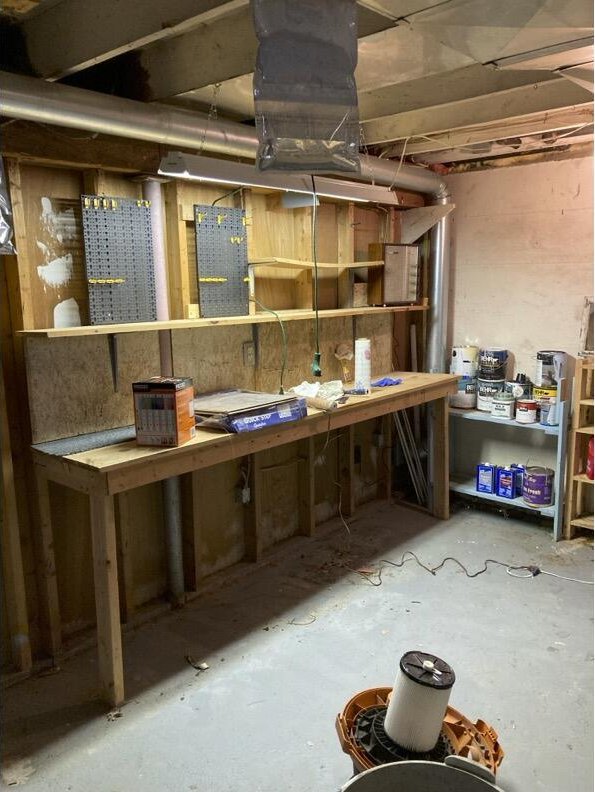 basement featuring a workshop area