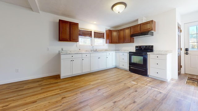 kitchen with beam ceiling, sink, black electric range, and light hardwood / wood-style flooring