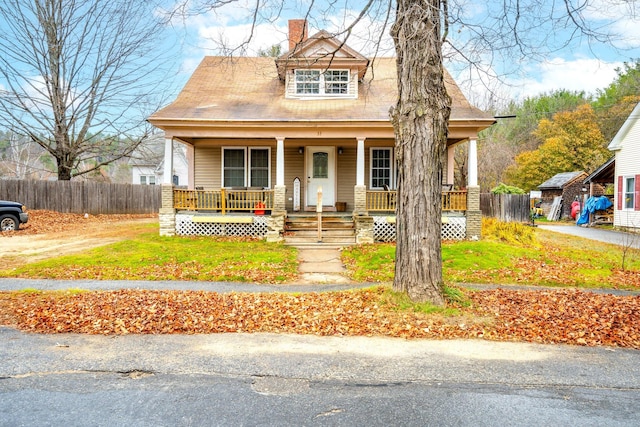 view of front of home featuring covered porch