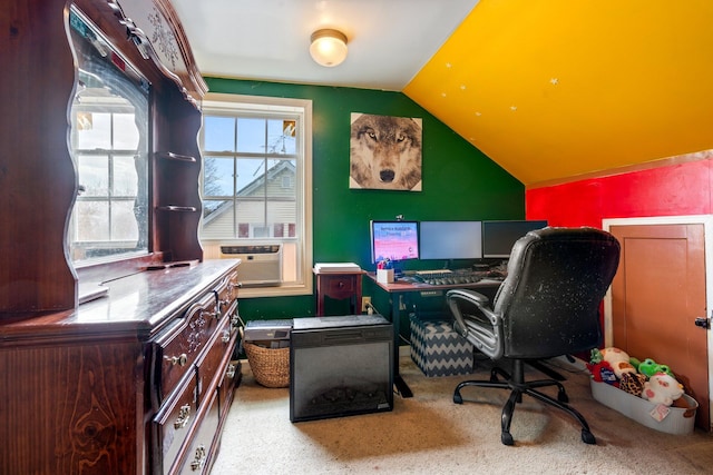 carpeted office space with cooling unit and vaulted ceiling